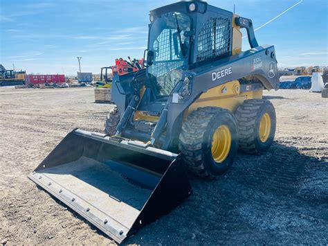 deere 332 skid steer with grapple attachment|john deere skid steer.